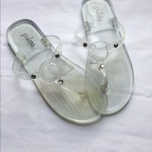 Clear jelly flip flops size 3